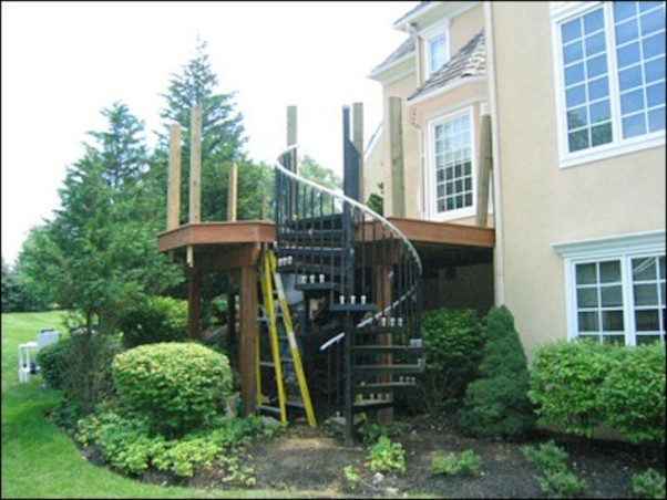 install the spiral staircase with IPE treads for a custom ipe deck